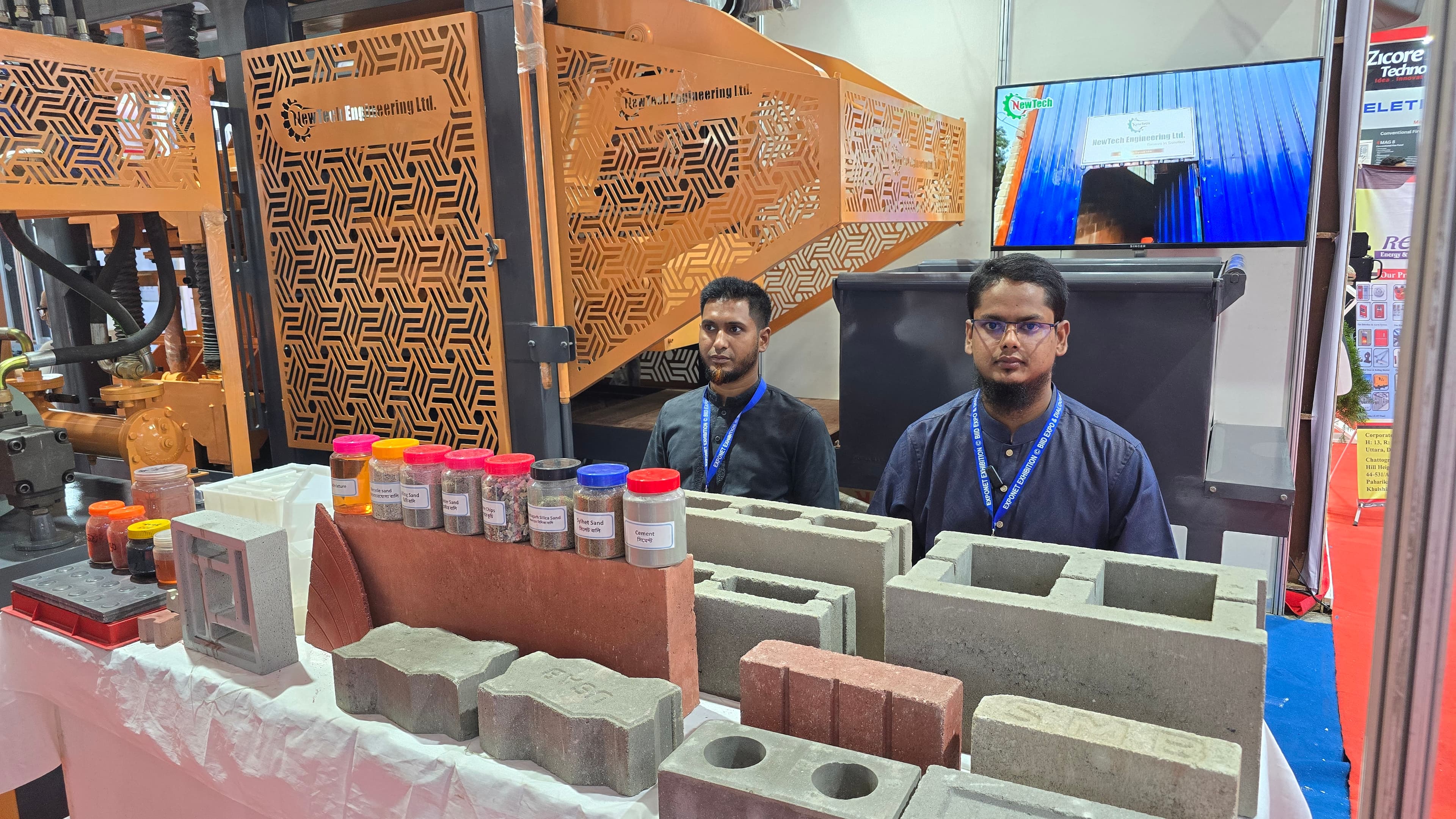 NewTech Engineering stall with product catalogue and live machine demonstration